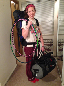 Modeling my hiking backpack, my 70 liter dry-bag duffel, and my hula hoops which are my carry on item (they will be coiled down for the flight). My bags each weigh about 35 pounds- well under the 50 pound weight limit!